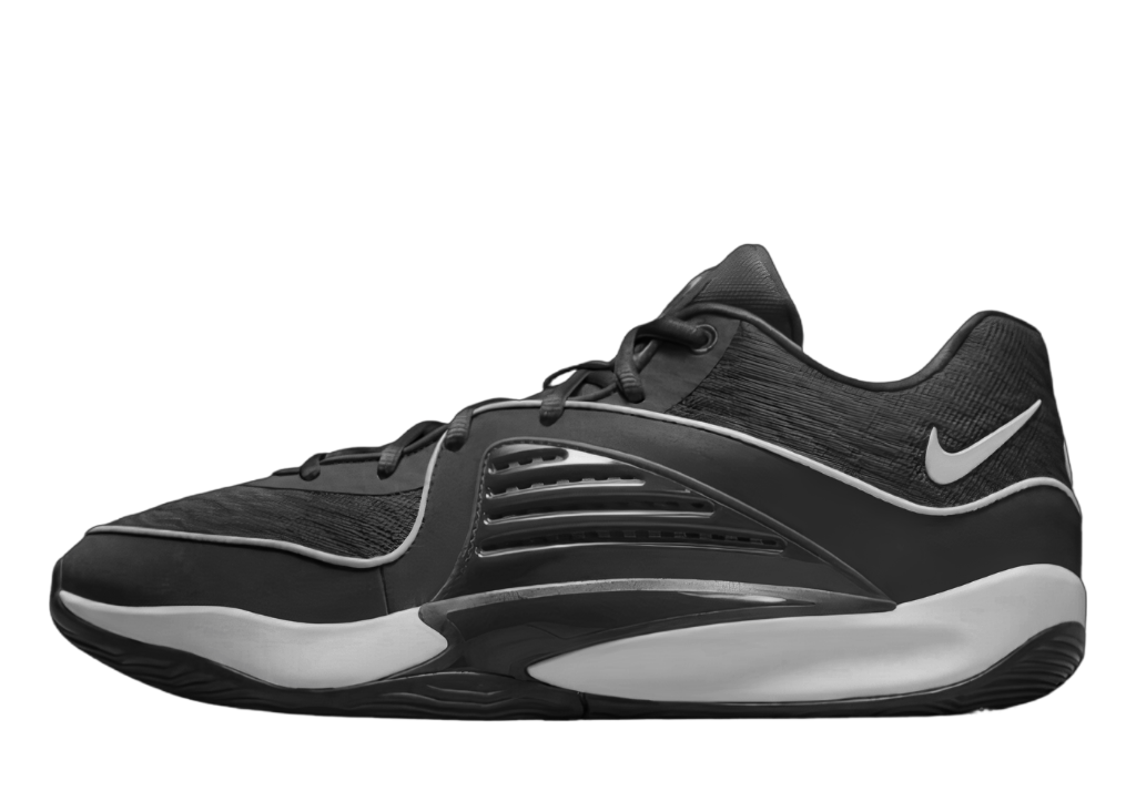 A black and white basketball shoe on a black background.